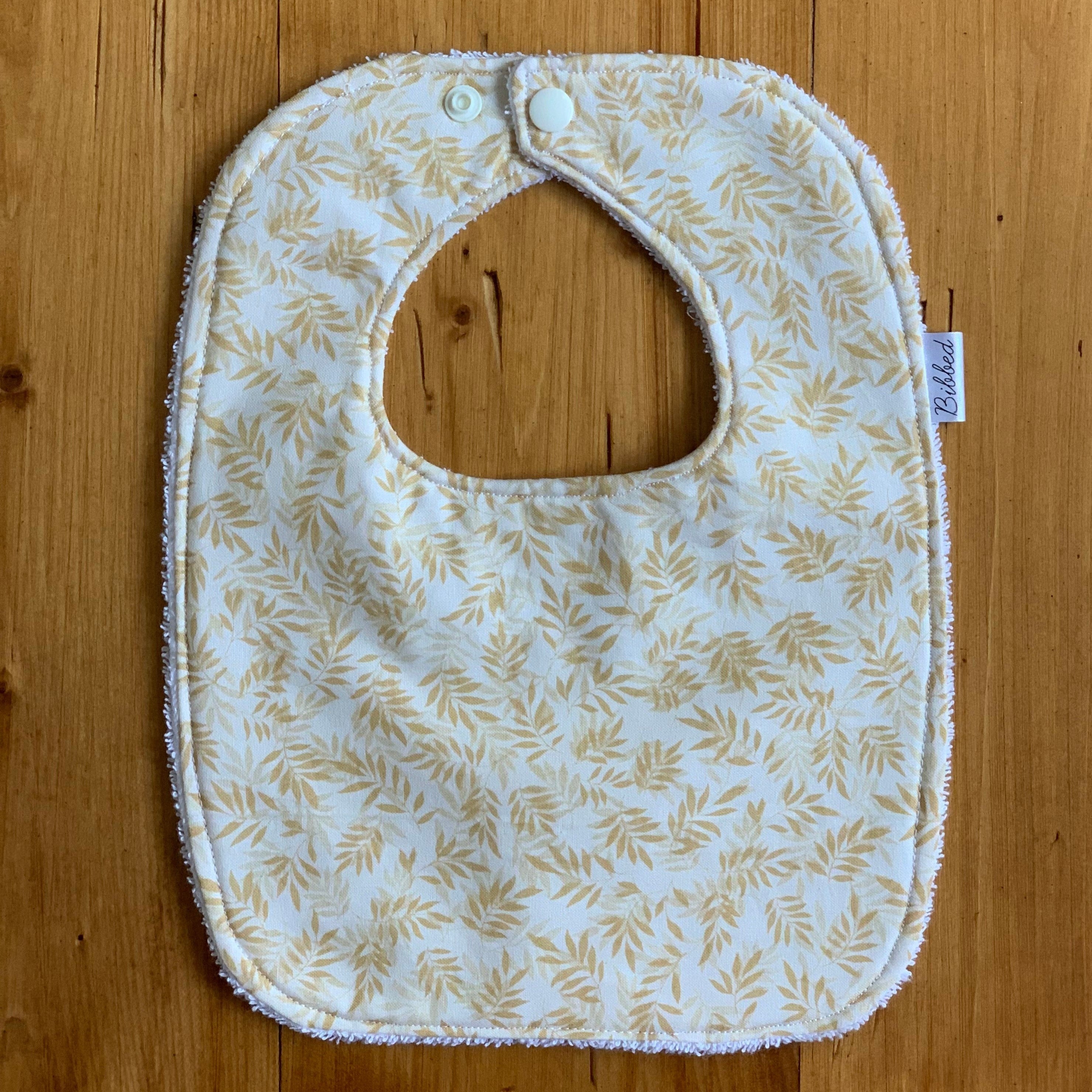 Cream Leaves Dinner Bib